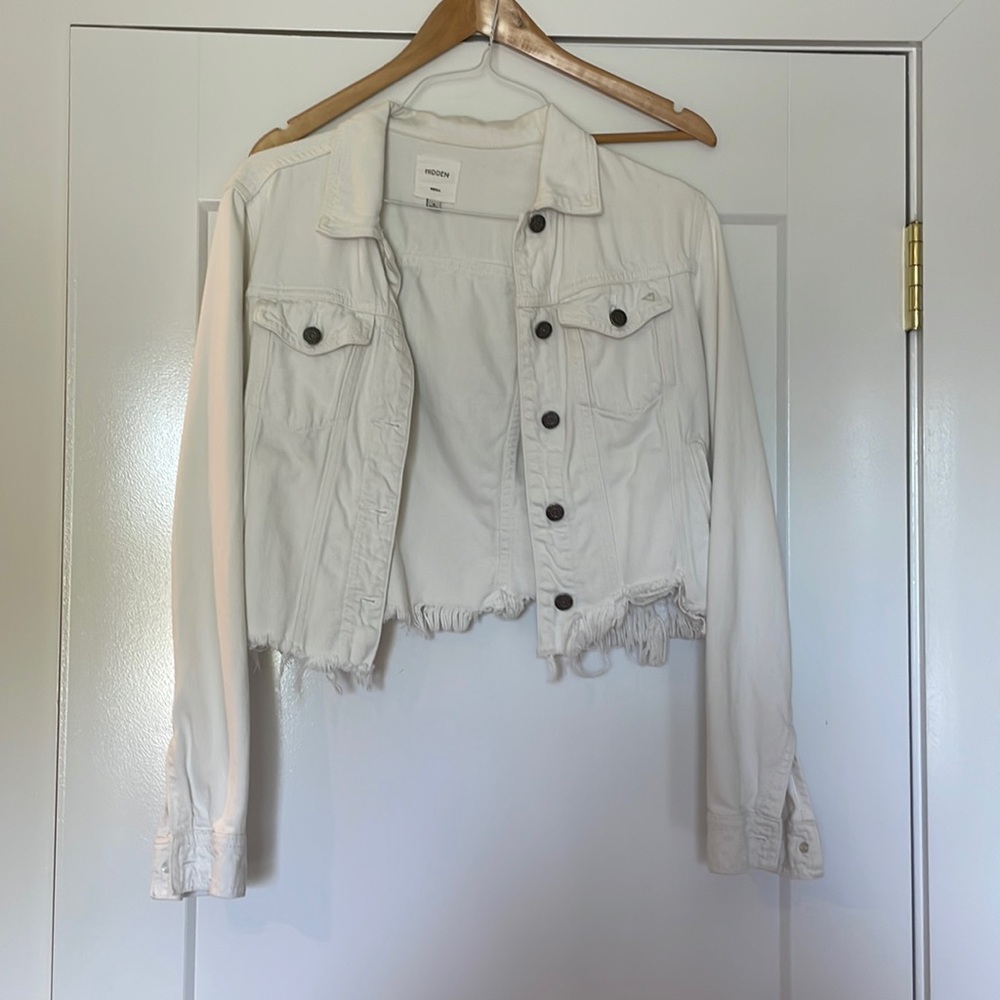 Frayed, white jean jacket